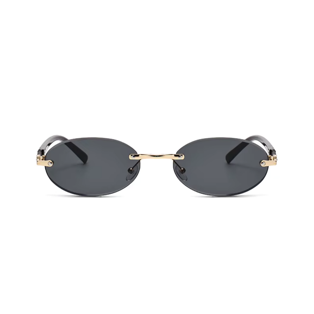 girlzhood Liviara Sonnenbrille mit ovalen, rahmenlosen Gläsern in Smoked Black und goldenen Bügeldetails