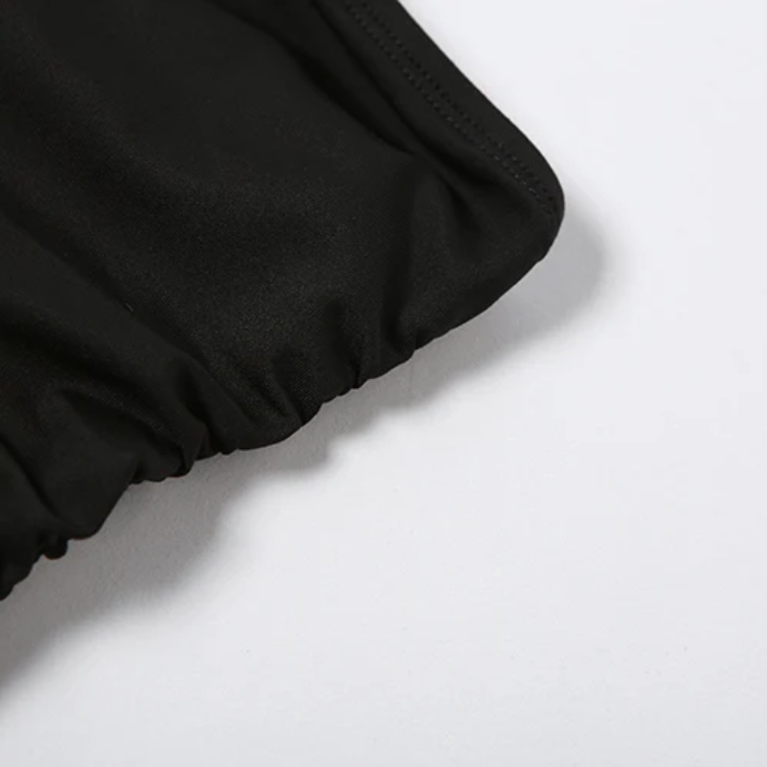 girlzhood schwarzes Bandeau-Kleid aus stretchigem Jersey mit gerafften Details in einer Nahaufnahme