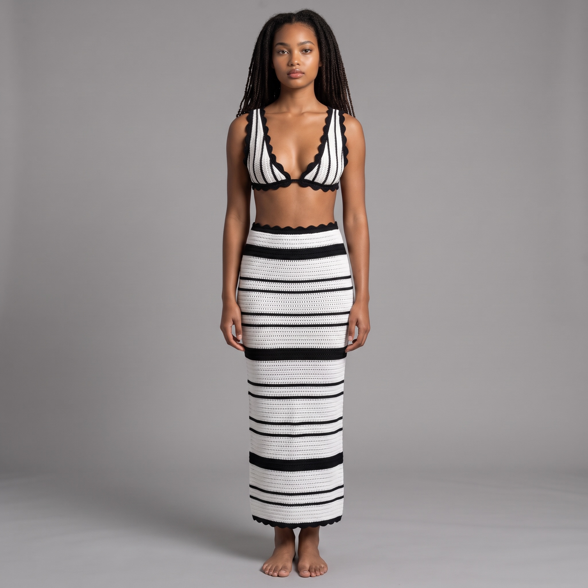 girlzhood Virelle Zweiteiler Set mit schwarz-weißem Häkel-Croptop und langem Maxi-Rock mit Wellenkanten